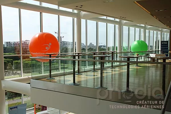 ballon hélium orange et vert kpmg